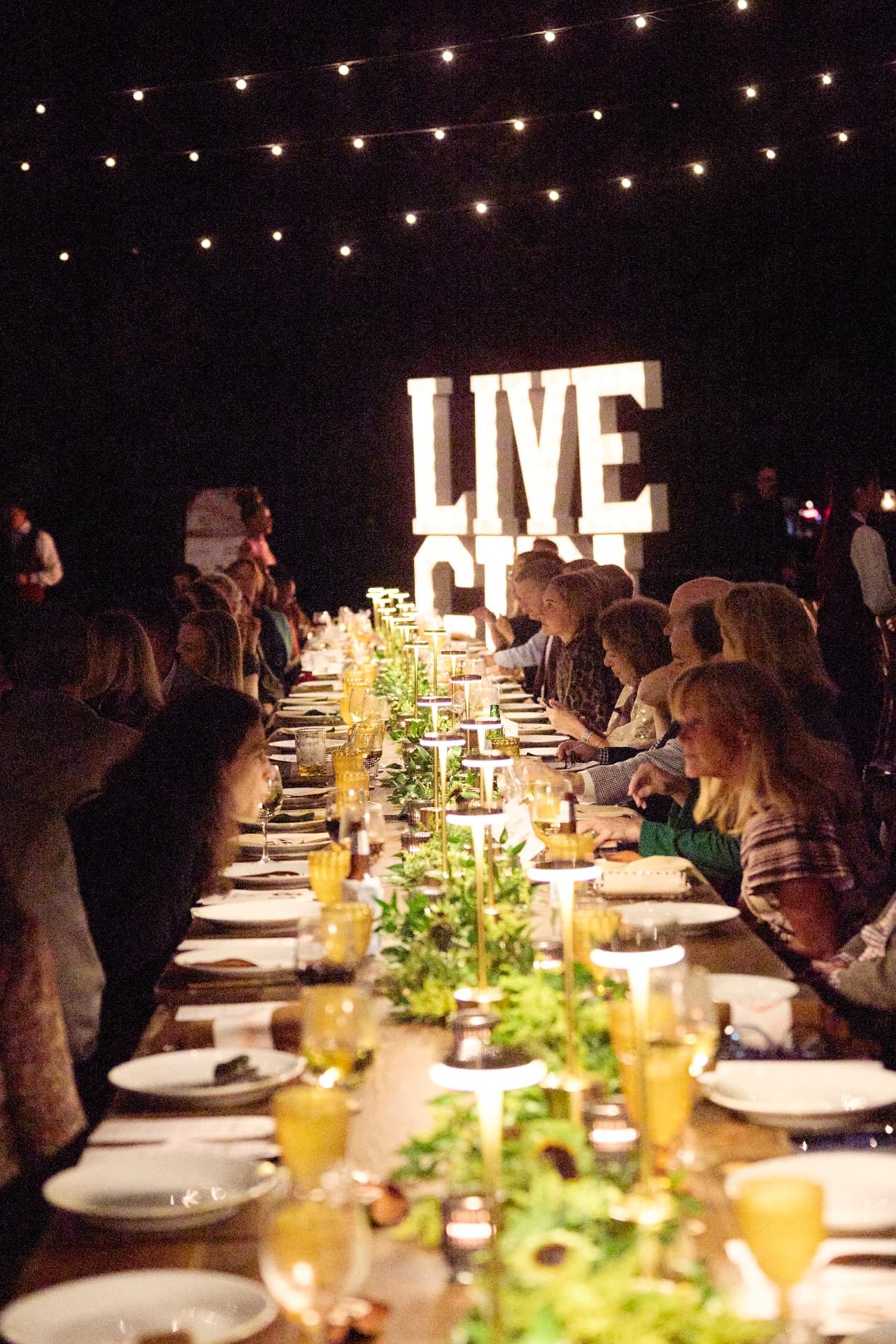Dinner under the string lights and LIVE letters