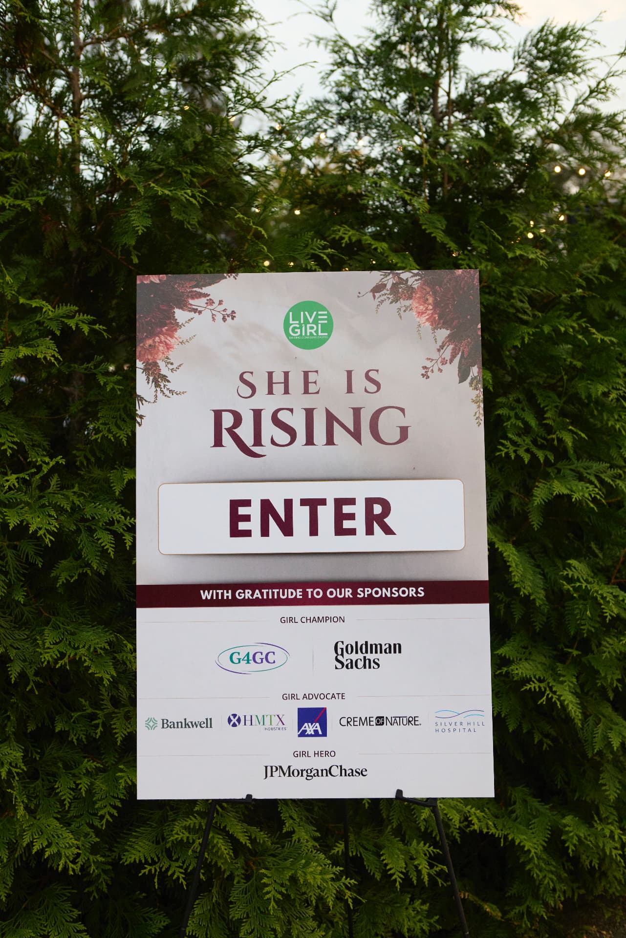 The She Is Rising welcome sign thanking our sponsors