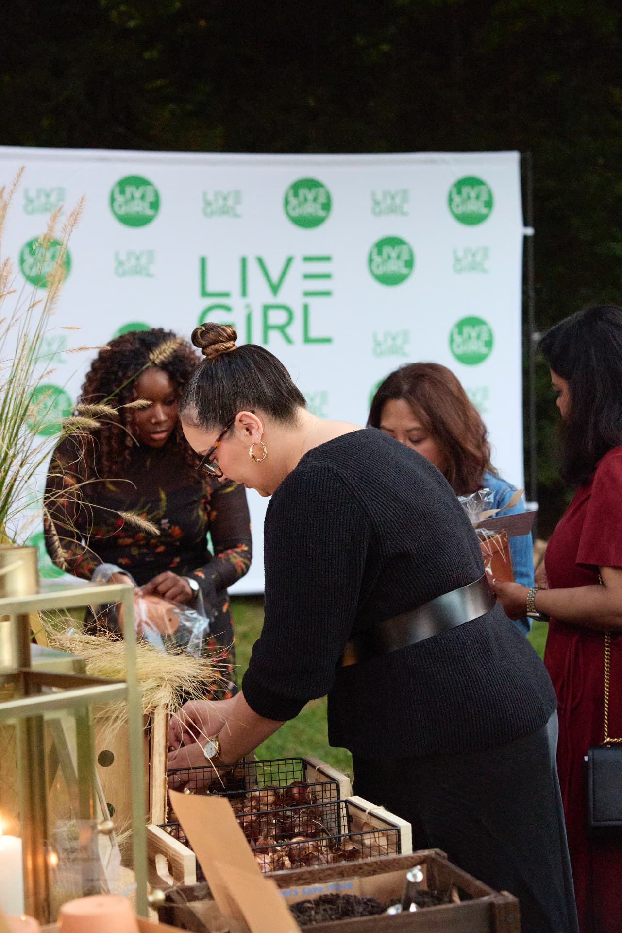 Guests potting bulbs at the She Is Rising Bulb Bar