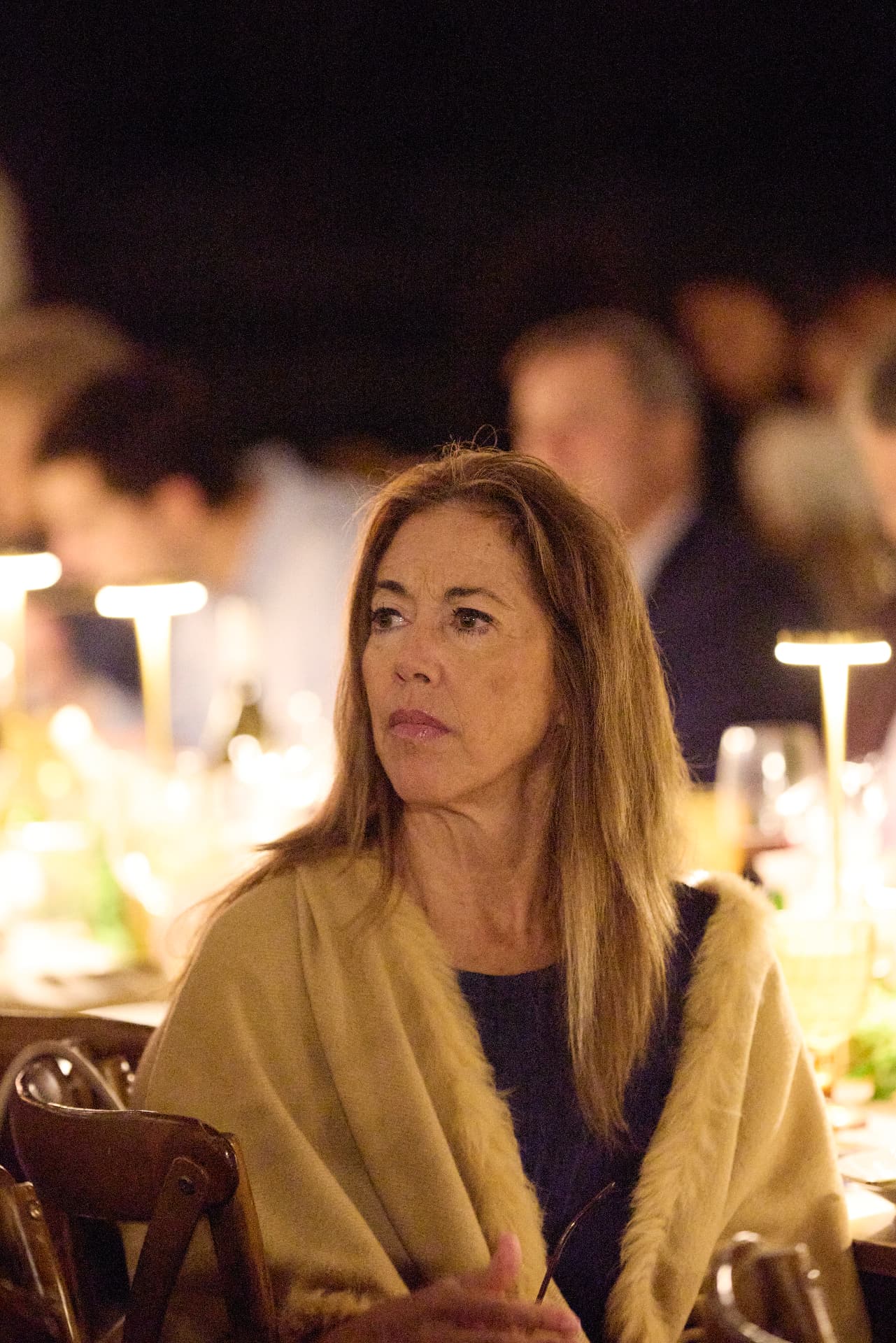 A guest listening during the program