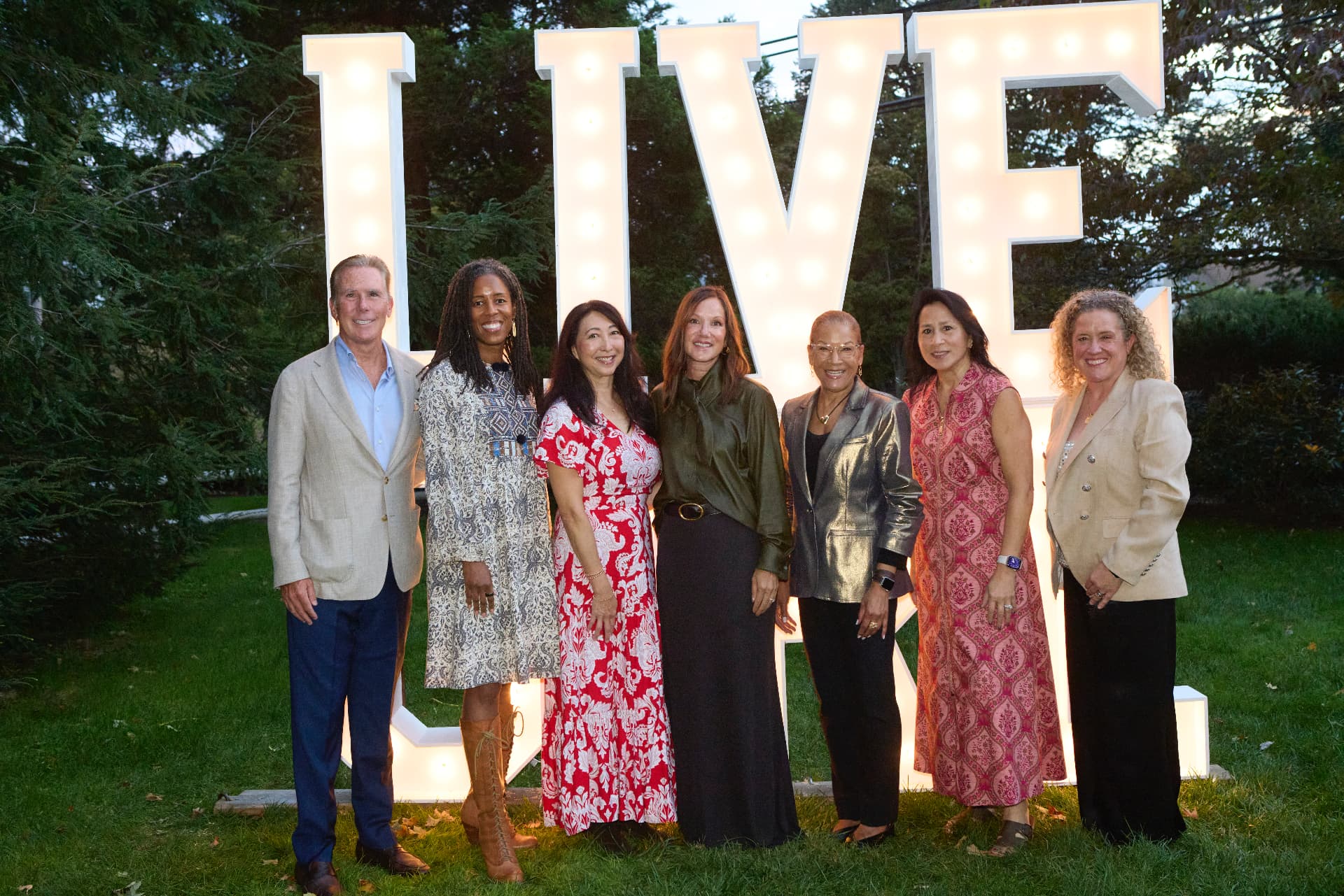 The LiveGirl Board of Directors at the step-and-repeat