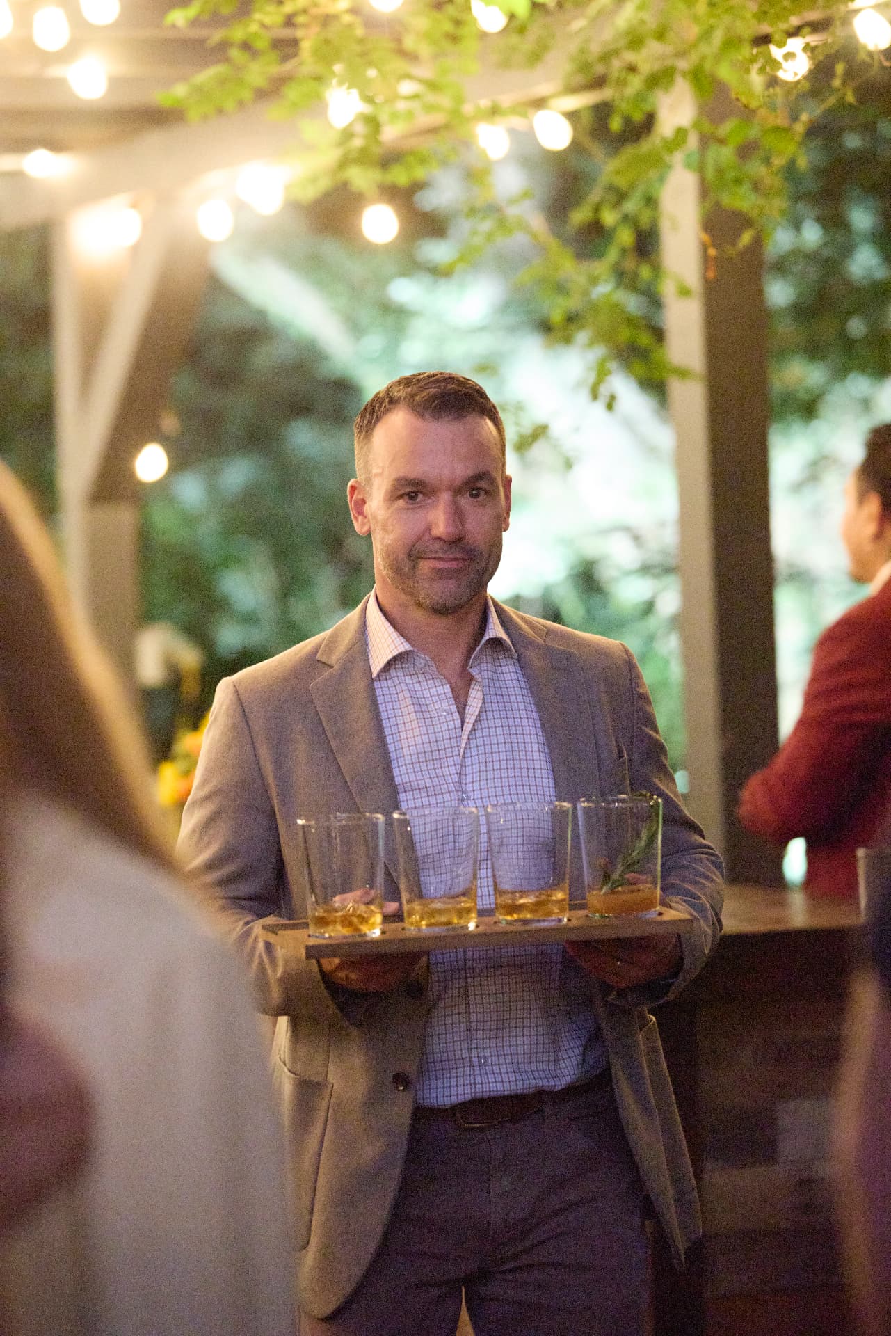 A tray of drinks arriving from the garden bar
