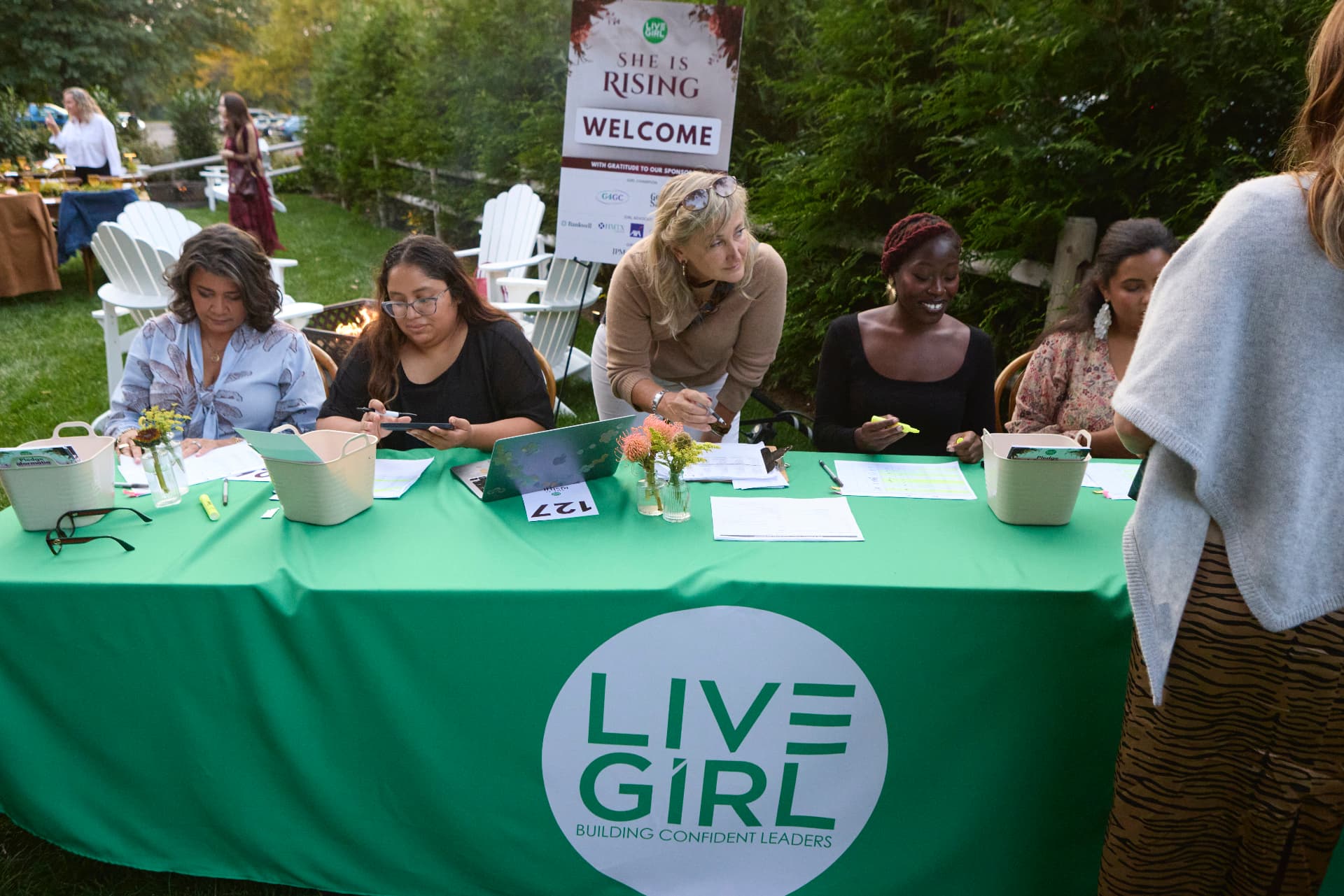 The LiveGirl check-in table