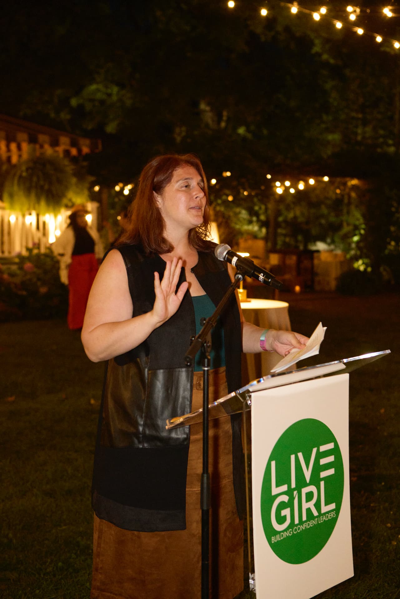 Sharing remarks at the lectern