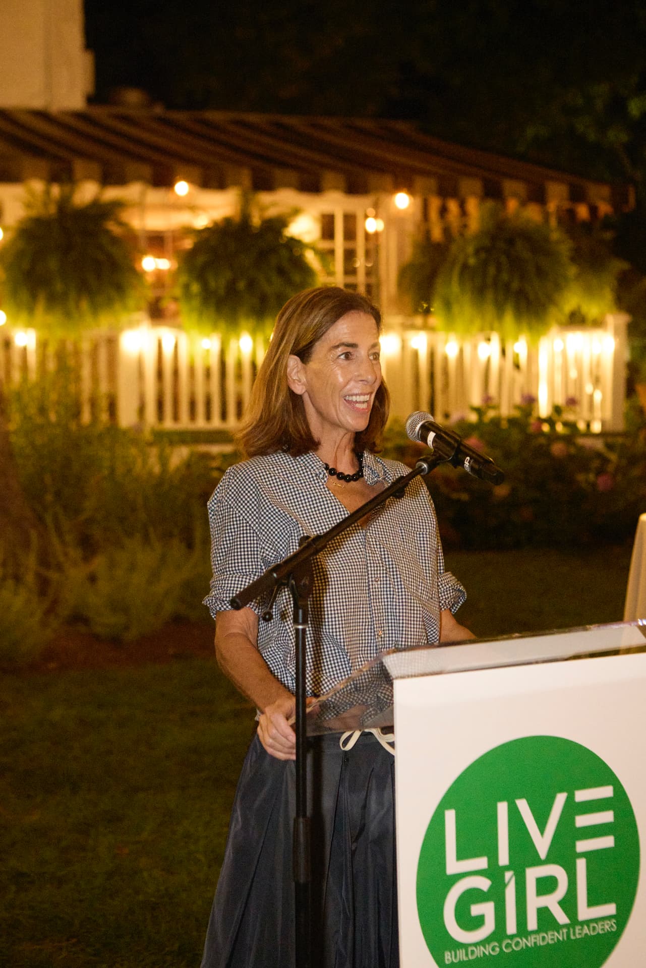 Changemaker Honoree Claire O'Hare sharing remarks at the LiveGirl lectern