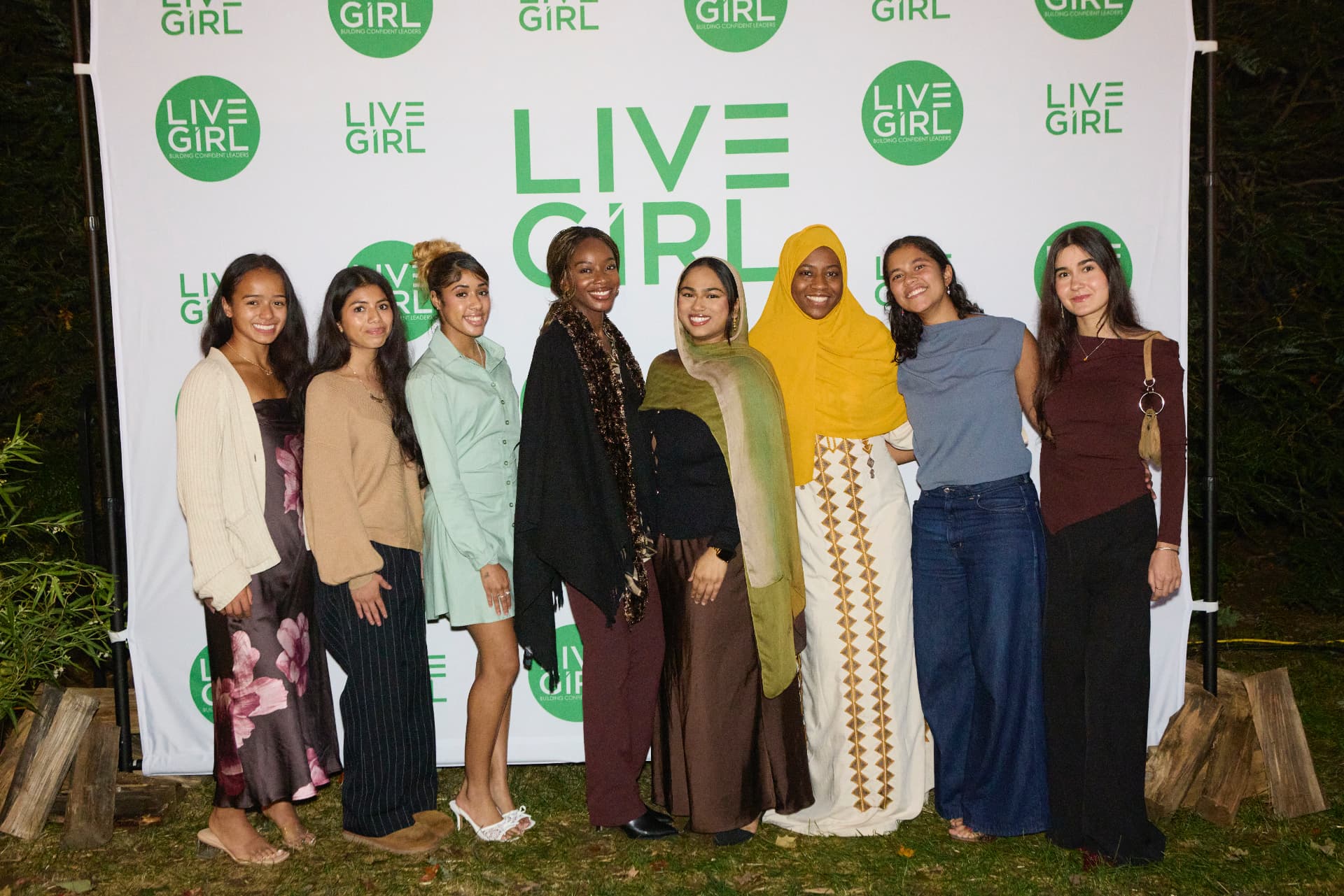 LiveGirl girls together at the step-and-repeat