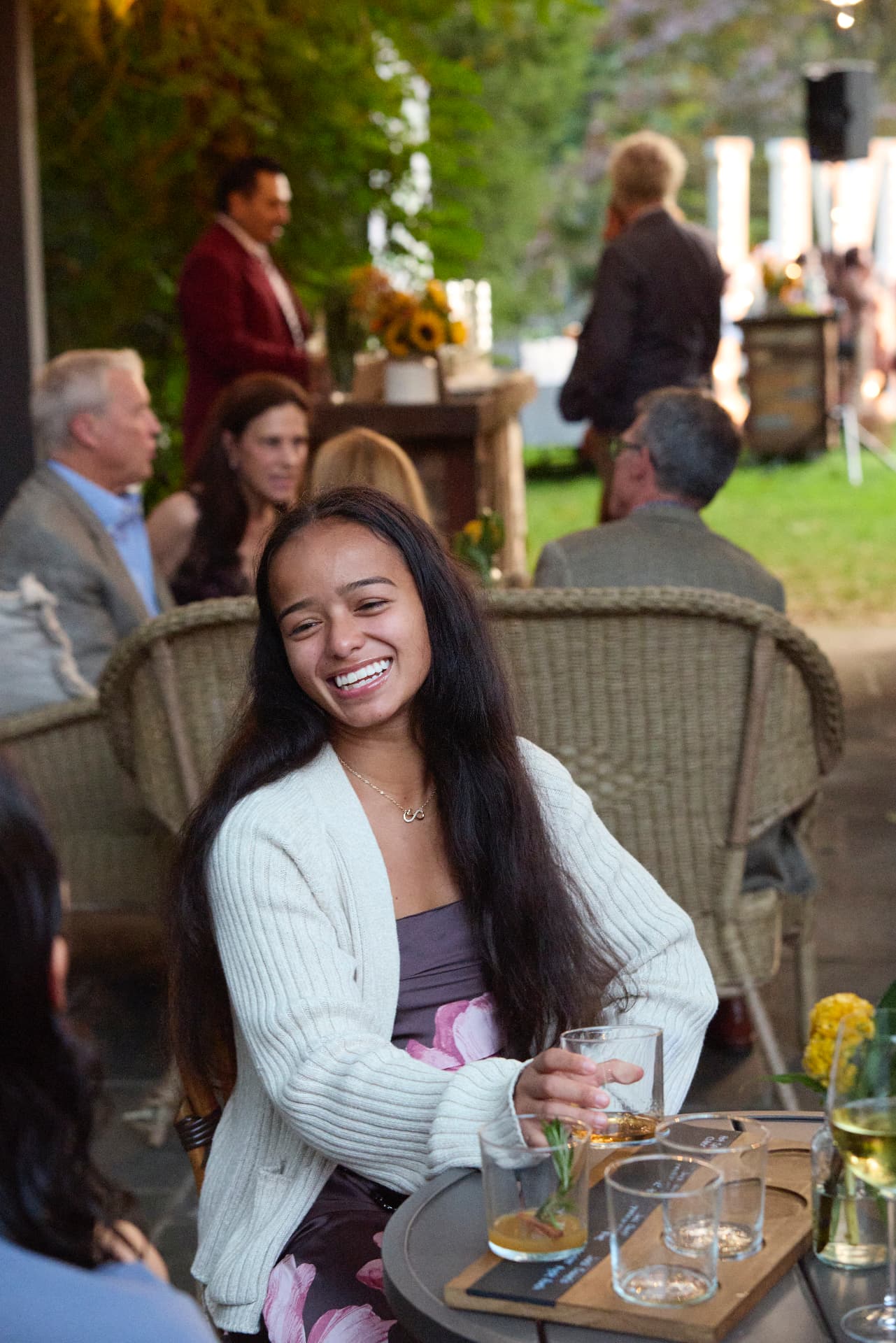 A young guest laughing during the evening
