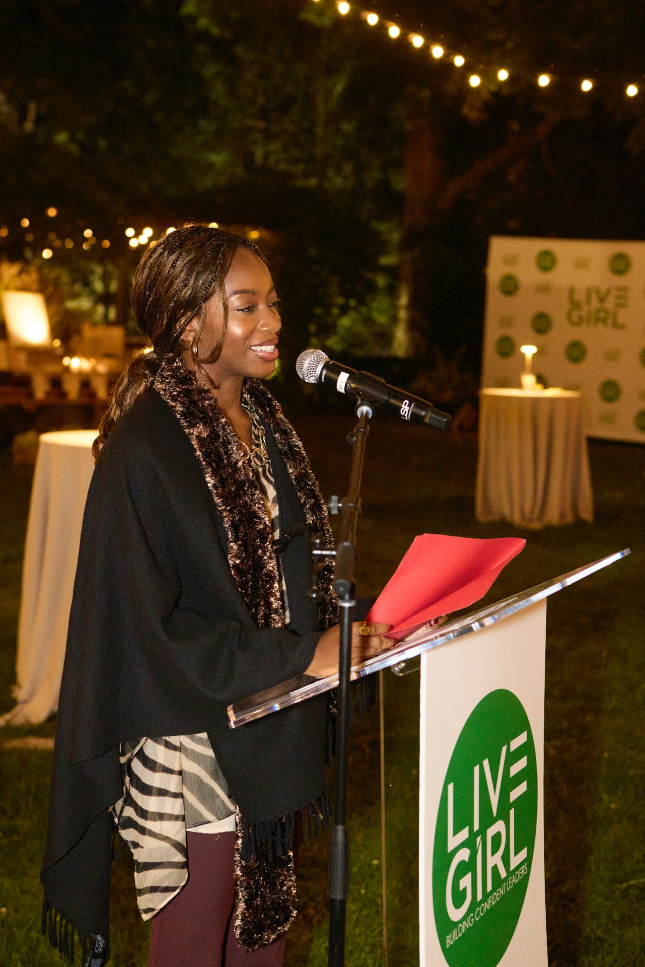 Schebania Philemon speaking at the LiveGirl lectern